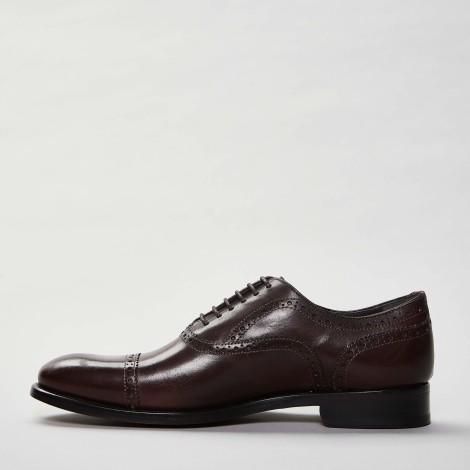 Stringata half brogue in pelle marrone