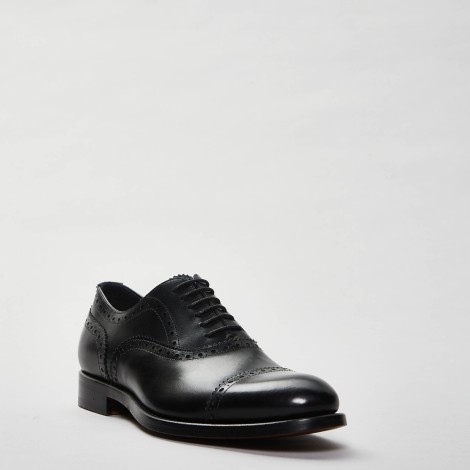 Stringata half brogue in pelle nera