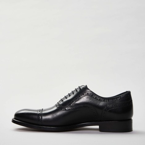 Stringata half brogue in pelle nera