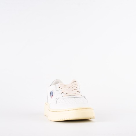 Sneakers in nappa bianca retro argento