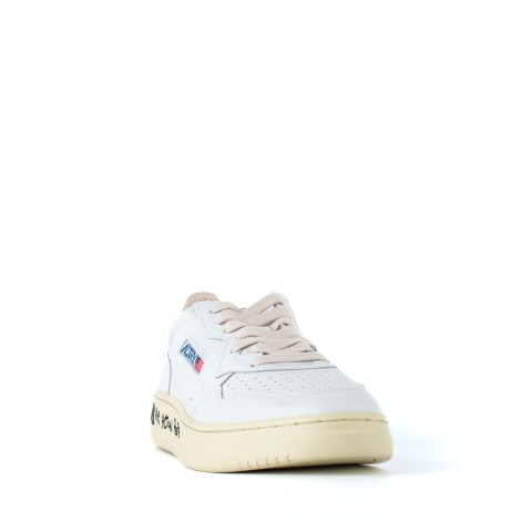 Sneakers in pelle bianca con scritta