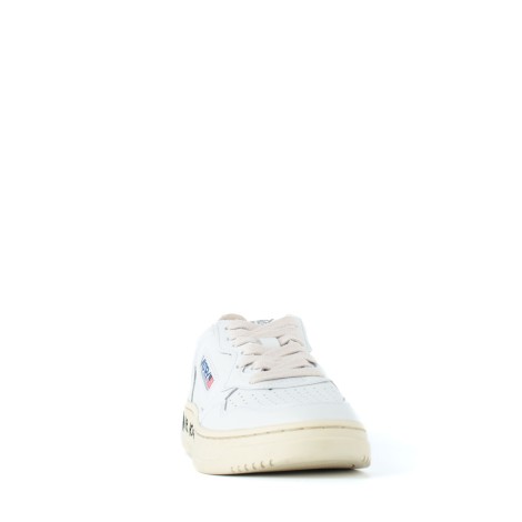 Sneakers pelle total white scritta suola