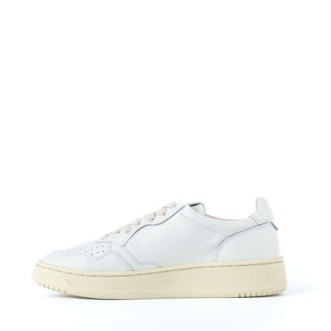 Sneakers pelle total white scritta suola