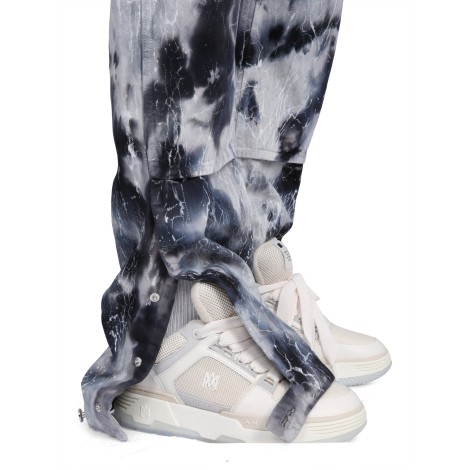 amiri cracked jeans tie-dye carpanter