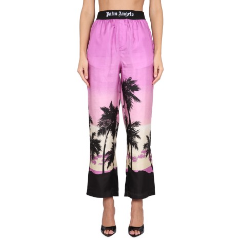 palm angels pants with sunset print