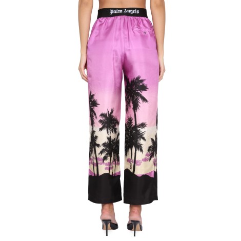 palm angels pants with sunset print