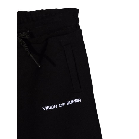 vision of super black pants kids with white spray flames