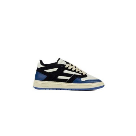 Sneakers REPTOR LOW di Represent, da uomo, colore nero e blu. Modello basso, realizzato con una tomaia in pelle e pelle scamosciata. Caratterizzato da suola in gomma, colletto imbottito e stringato. 