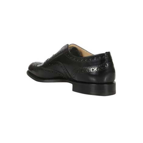 Scarpe di CHURCH'S, da uomo, colore nero. Modello francesine in pelle spazzolata lucida con dettagli brogue e punta a coda di rondine, suola in cuoio. Fit G. 