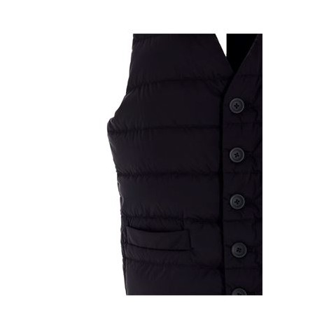 Gilet da uomo di Herno Legend, colore blu. Realizzato nel tessuto iconico Herno: materiale in nylon 20 denari a prova di piuma. Questo materiale ha un trattamento resistente alla pioggia (WR). Modello opaco, imbottito, con taschino filetto al petto e