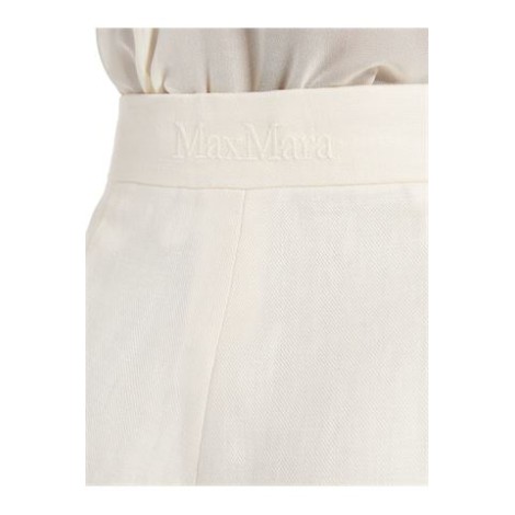 Pantalone HANGAR, di  Max Mara, da donna, colore bianco. Modello wide leg in leggero tessuto diagonale di puro lino. D'ispirazione sartoriale caratterizzata da linea ampia sulla gamba, piega stirata e tasche alla francese sui fianchi. Rifinito c