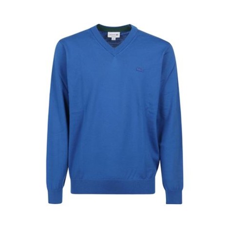 Maglia di LACOSTE, da uomo, colore bluette. Realizzato in lana merinos. Caratterizzato da dettaglio logo piccolo e scollo a V. Fondo e polsini a costine. Vestibilità regolare.  