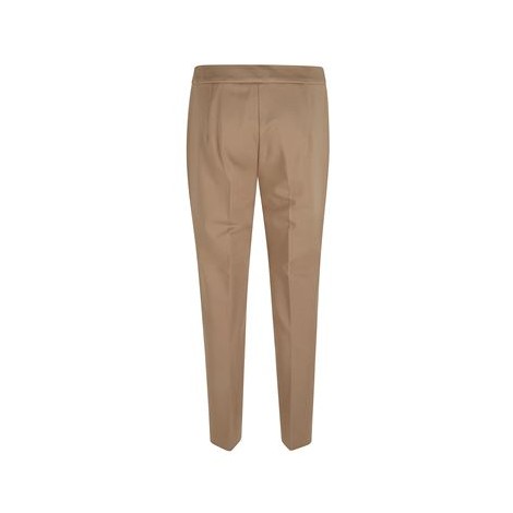 Pantalone PEGNO di Max Mara. Colore cammello. Realizzato in jersey compatto di misto viscosa stretch. Tasche alla francese sui fianchi, fessa maschile davanti, con gancio.Vita regolare e vestibilità slim fit. 