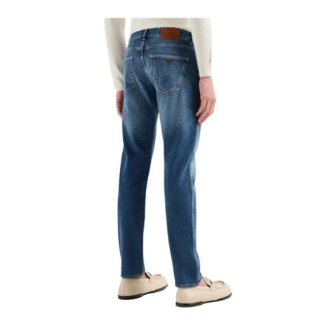 Jeans di Dsquared2, da uomo, colore denim. Realizzato in cotone elasticizzato, applicazione posteriore con logo e modello a vita bassa.Passanti, chiusura con bottone e zip nascosta. 