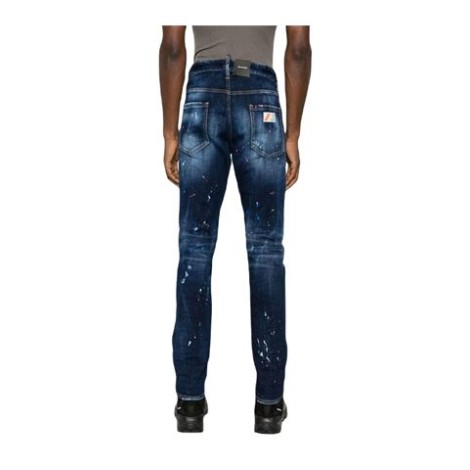 Jeans skinny Cool Guy colore in denim elasticizzato effetto vissuto e sbiaditodettaglio effetto vernice , applicazione posteriore con logo , chiusura frontale con bottoni e zip. 