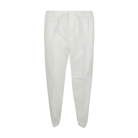 Pantalone di Eleventy, da uomo, colore bianco. Modello jogger. Coulisse alla vita, passanti per cintura e chiusura con bottone e zip. Tasche. Vestibilità regolare. 