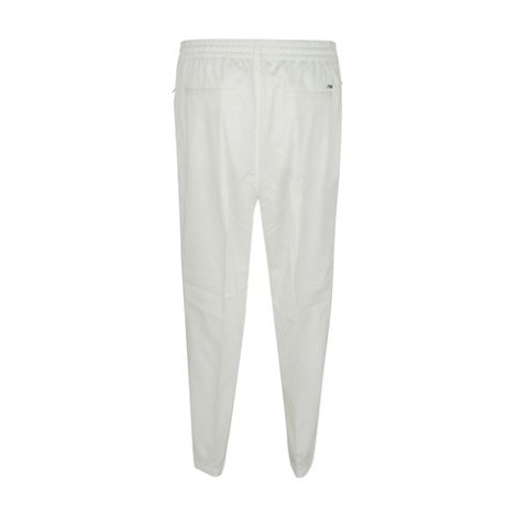 Pantalone di Eleventy, da uomo, colore bianco. Modello jogger. Coulisse alla vita, passanti per cintura e chiusura con bottone e zip. Tasche. Vestibilità regolare. 