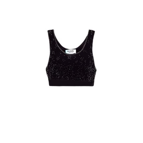 Top in georgette dalla linea ampia con collo tondo, spalline a canotte e giromanica ampio .   