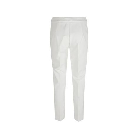 Pantalone PEGNO di Max Mara. Colore bianco. Realizzato in jersey compatto di misto viscosa stretch. Tasche alla francese sui fianchi, fessa maschile davanti, con gancio.Vita regolare e vestibilità slim fit. 