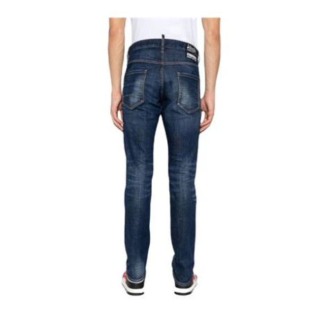 Jeans slim Cool Guy con effetto vissuto colore blu navy ,  denim elasticizzato,cuciture a contrasto, applicazione posteriore con logo, mini targhetta con logo ,chiusura frontale con bottoni, vita media. 