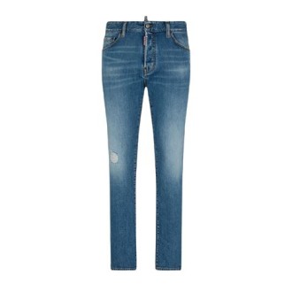 Jeans di Dsquared2, da uomo, colore denim. Modello cool guy slim, realizzato in cotone elasticizzato. Applicazione posteriore con logo, effetto vintage nelle cosce, dettagli con strappi, taglio slim, chiusura con bottone e zip nascosta. 