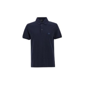 Polo di Etro da uomo, color blu. Modello in piquet di cotone, impreziosita da un sottocollo decorato con una stampa Paisley. Caratterizzata dal logo sul petto. 