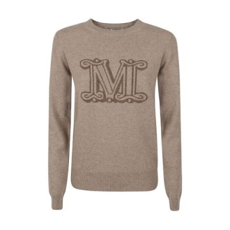 Maglia PAMIR di Max Mara, da donna colore cachà. Modello girocollo, realizzato interamente in lussuoso cashmere nero e presenta il motivo “M” del brand sul davanti. 