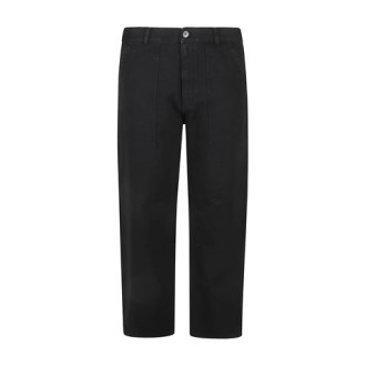Pantalone di Philippe Model, color nero. Modello realizzato in tela di puro cotone con tasche applicate e impunture a contrasto. 